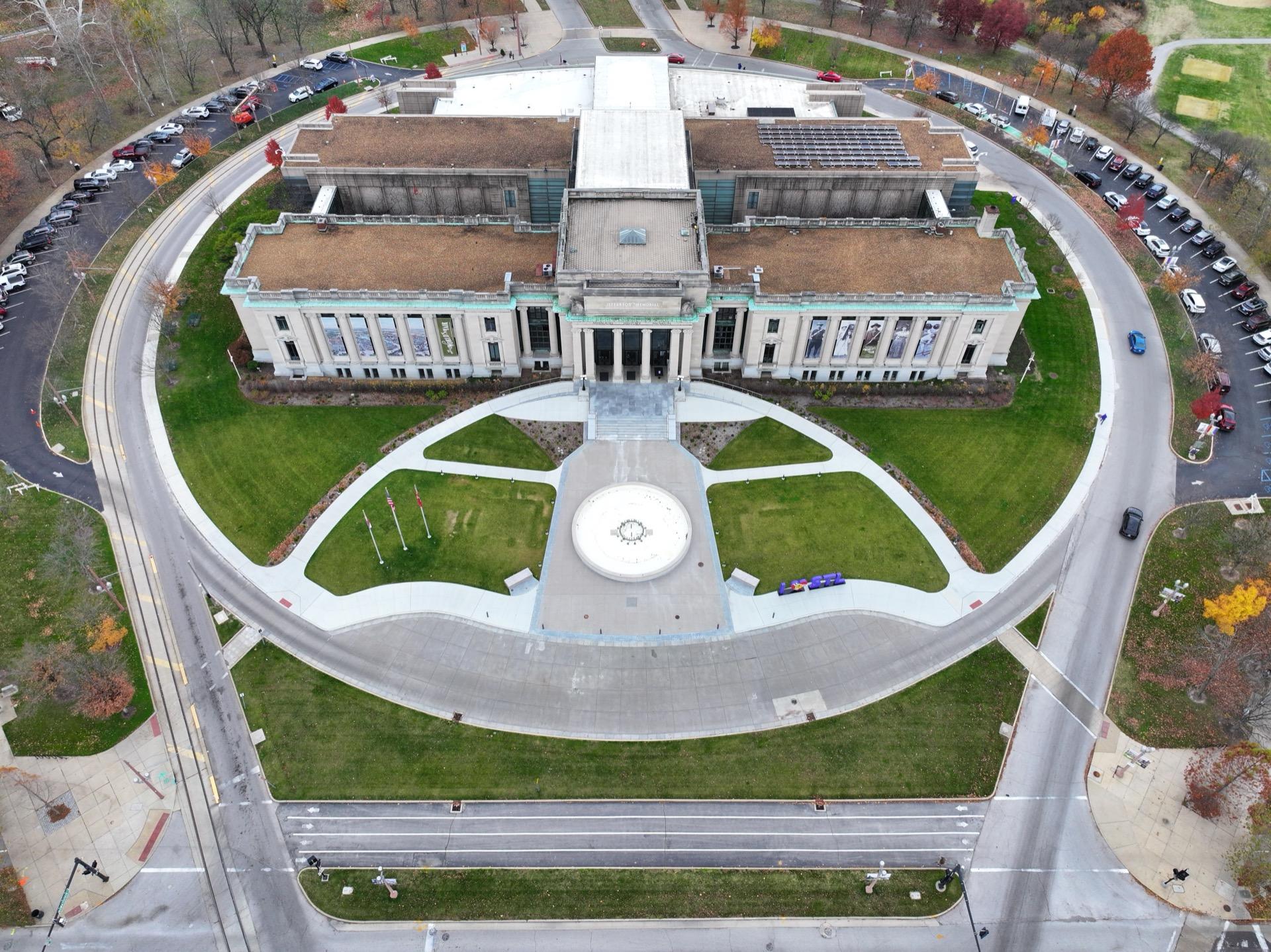 Aerial photography of grand civic building with landscaped grounds